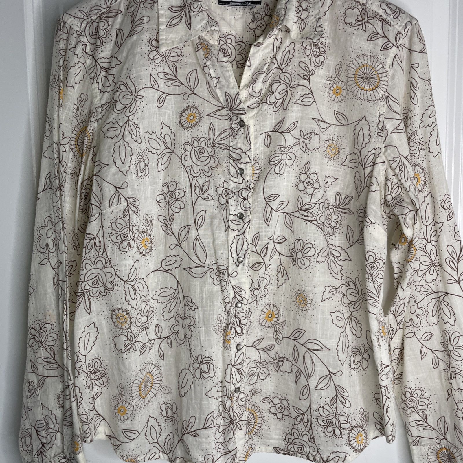 Columbia sportswear Company women’s long sleeve pearl snap collared floral Top