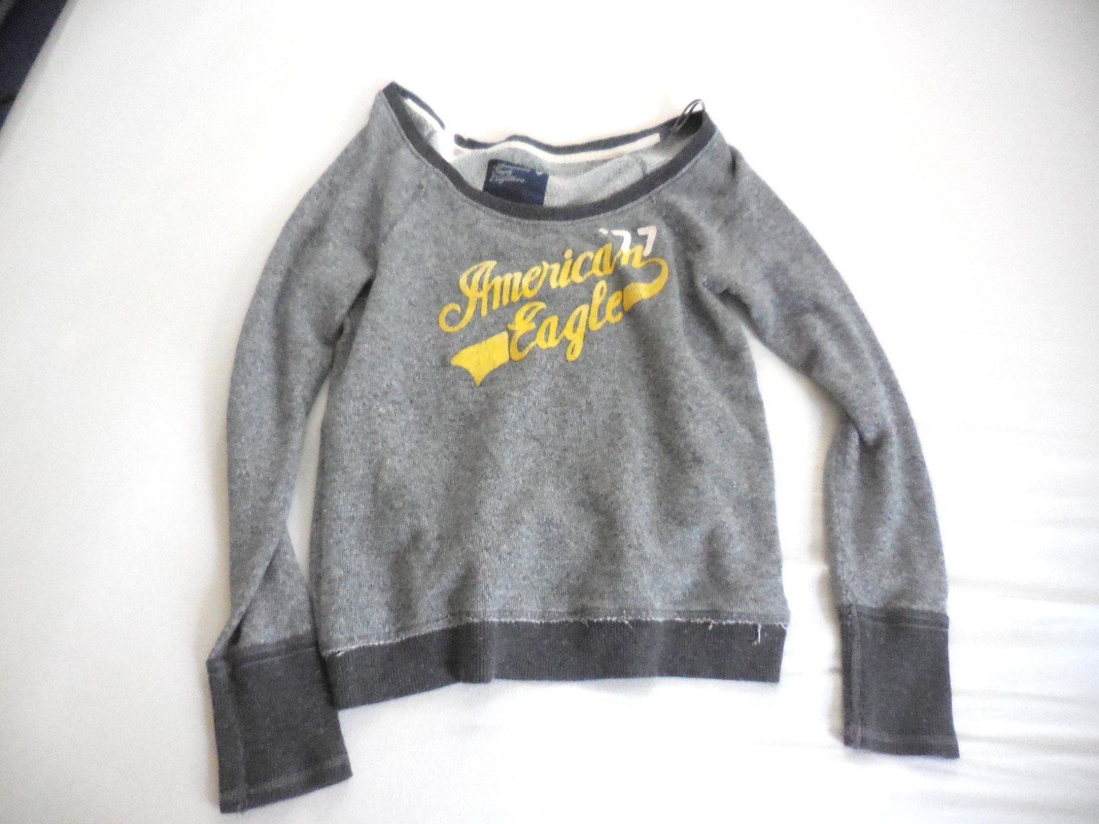 Size M, Ladies Distressed American Eagle Off Shoulder Sweater