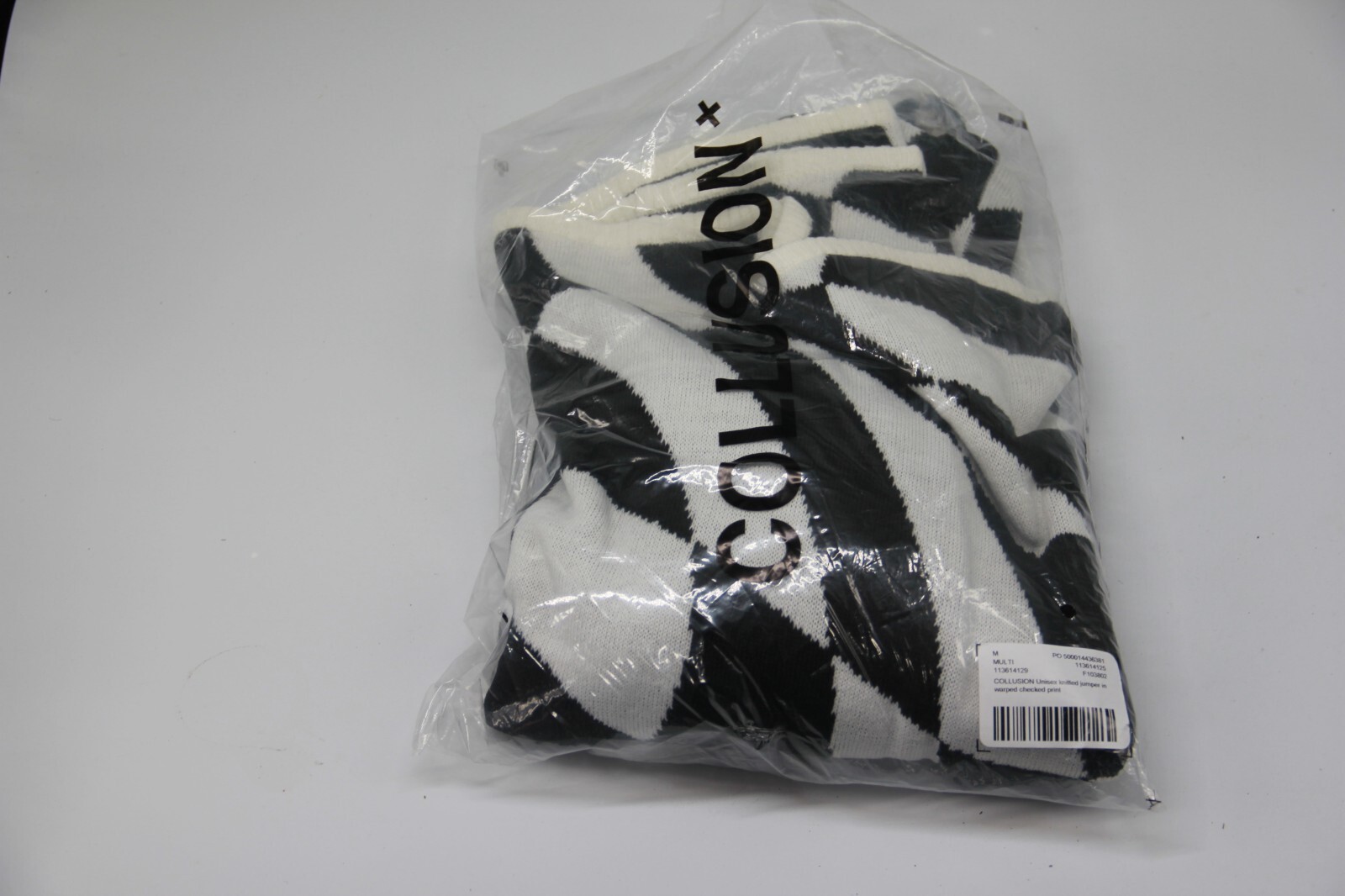 COLLUSION Unisex knitted jumper in warped checked print Medium