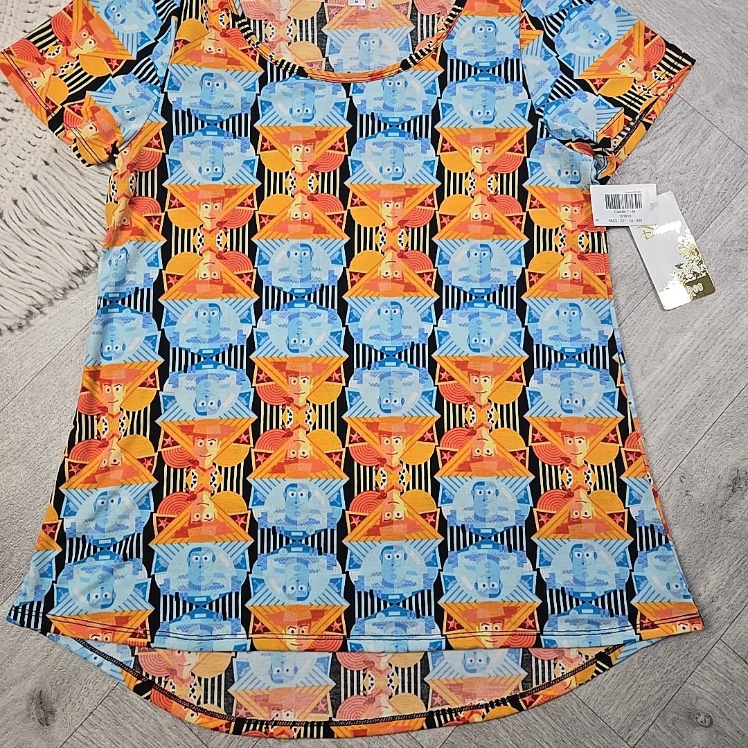 New! LuLaRoe Medium Disney’s Toy Story Buzz Lightyear Woody Shirt Blouse