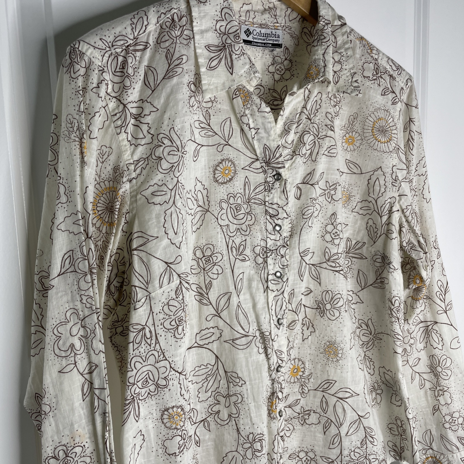 Columbia sportswear Company women’s long sleeve pearl snap collared floral Top