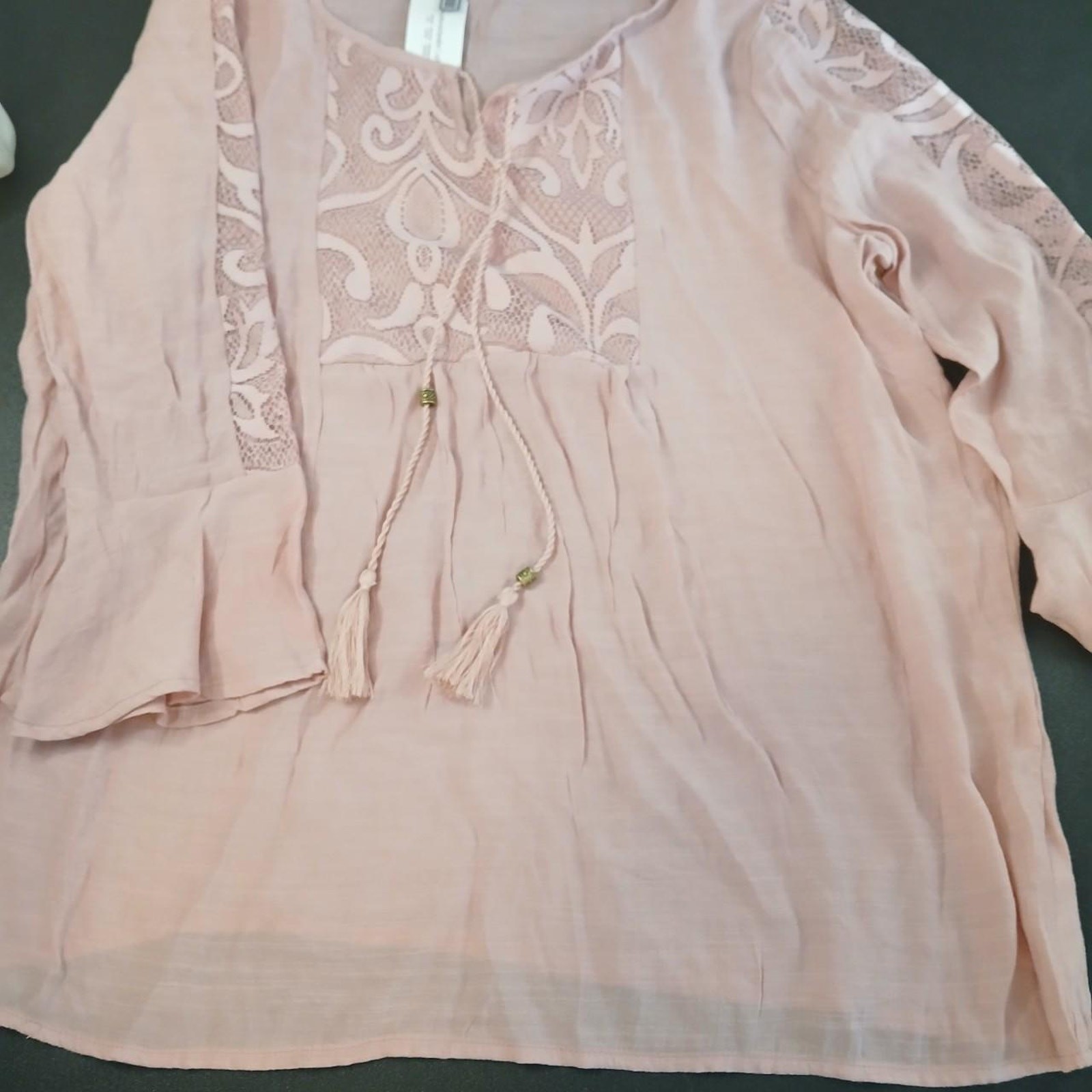 Pink lace top with tassels