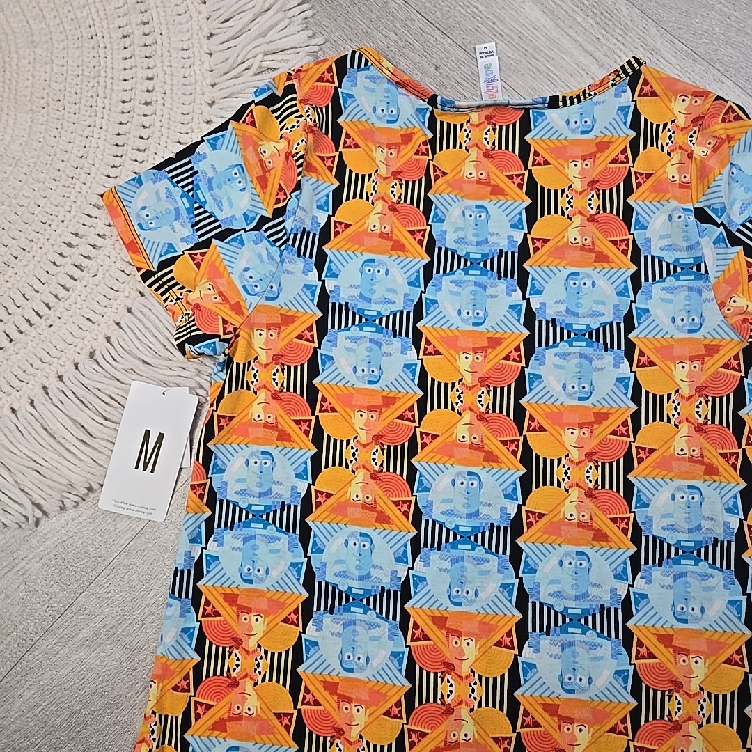 New! LuLaRoe Medium Disney’s Toy Story Buzz Lightyear Woody Shirt Blouse