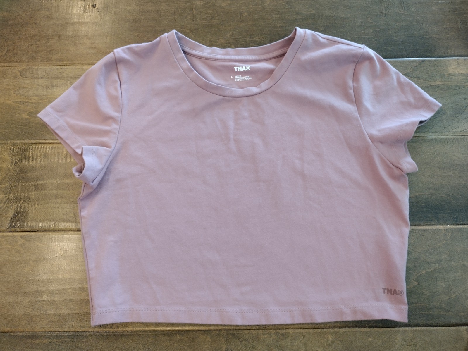 TNA ARITZIA Women’s short-sleeve athleisure blush pink crop top – size L Large