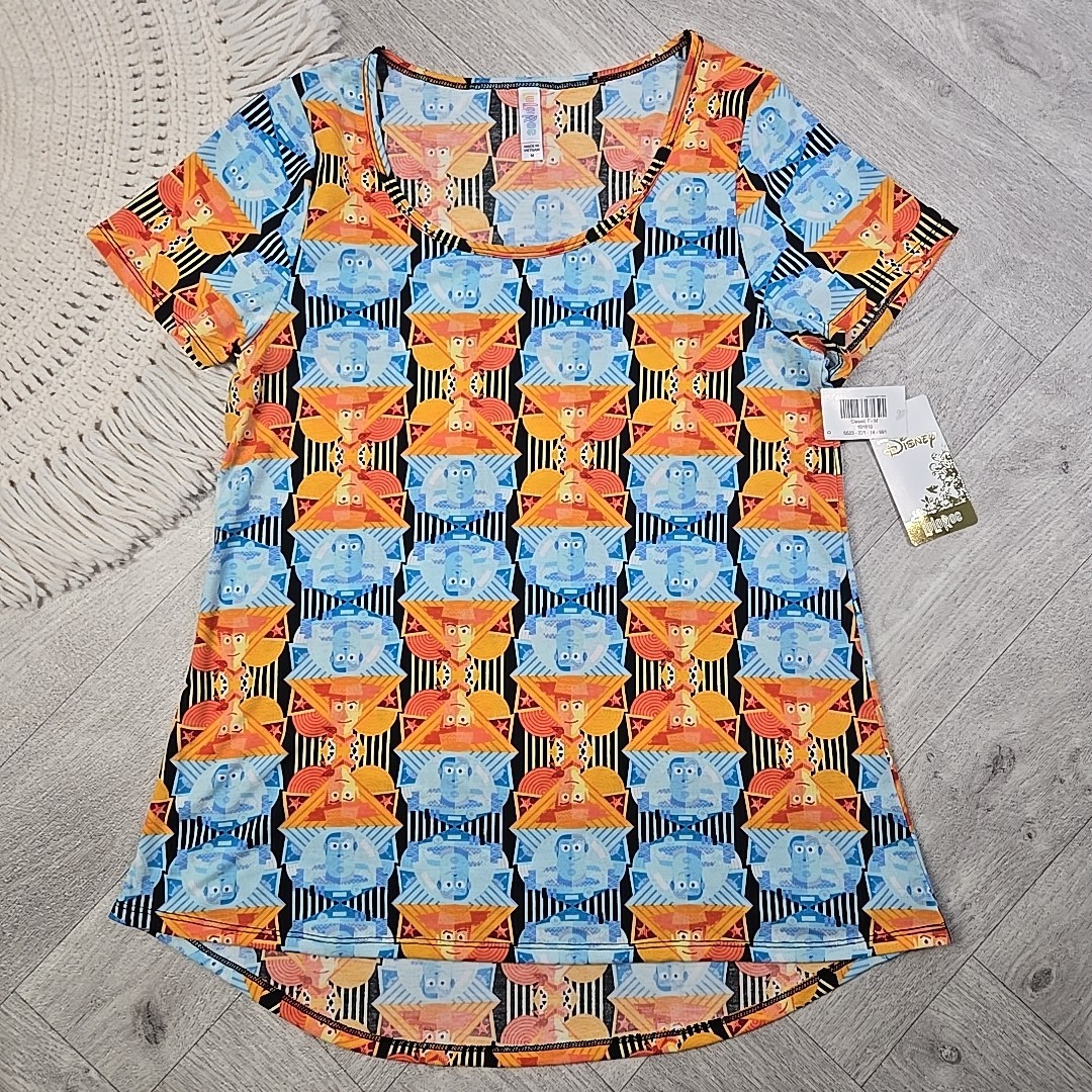 New! LuLaRoe Medium Disney’s Toy Story Buzz Lightyear Woody Shirt Blouse