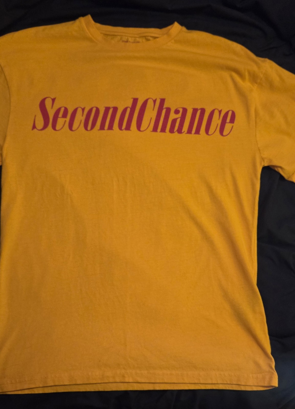 mustard yellow crew neck t-shirt “Second Chance” in a bold font. Size Small