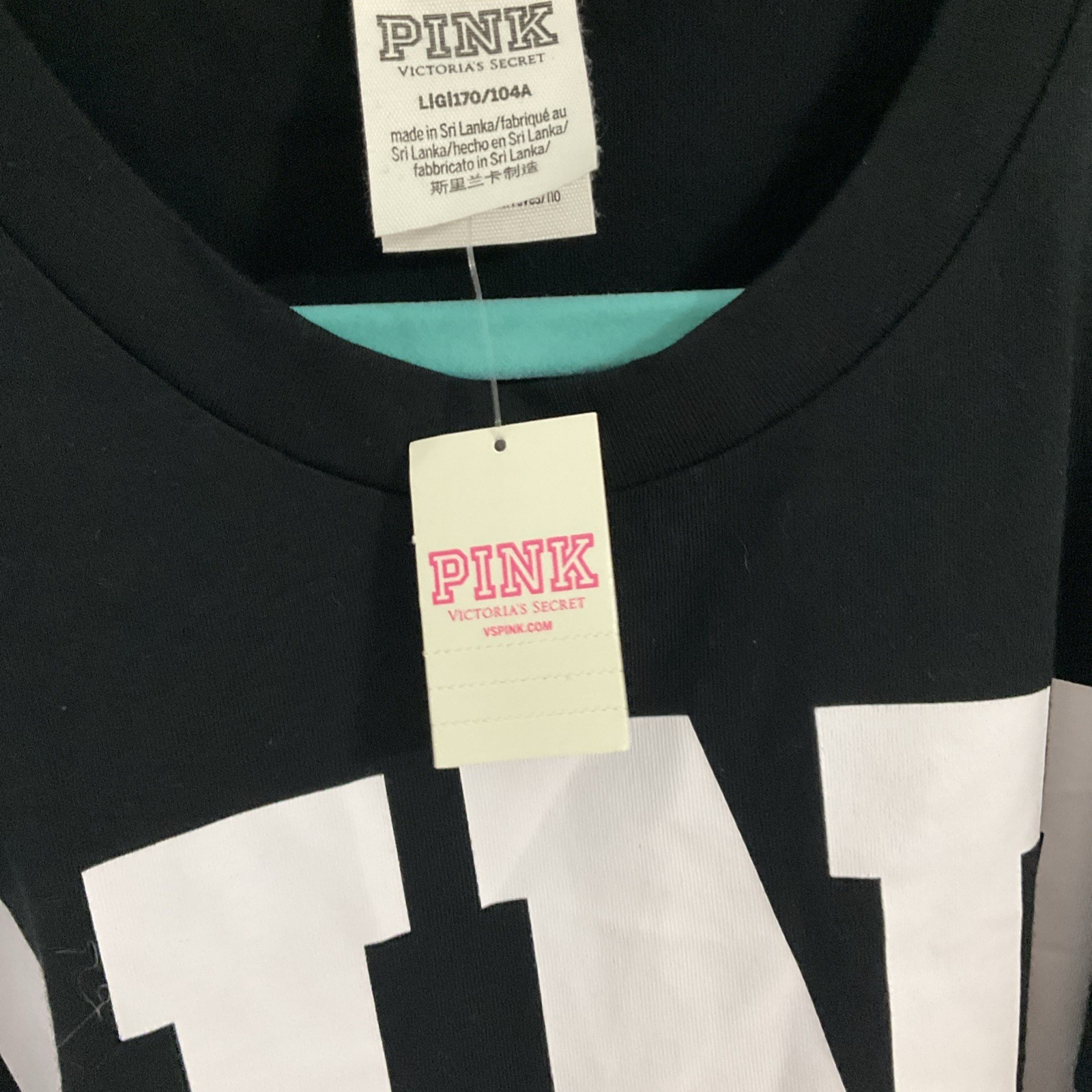 NWT VS pink open shoulder black logo long sleeve top size L