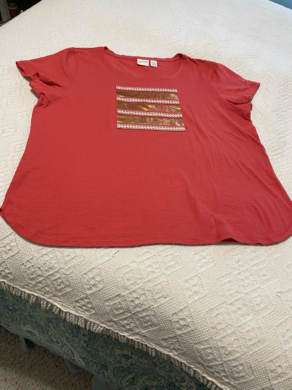 Chico’s orange/gold trim knit top, cap slvs, shaped hem, 3/xl